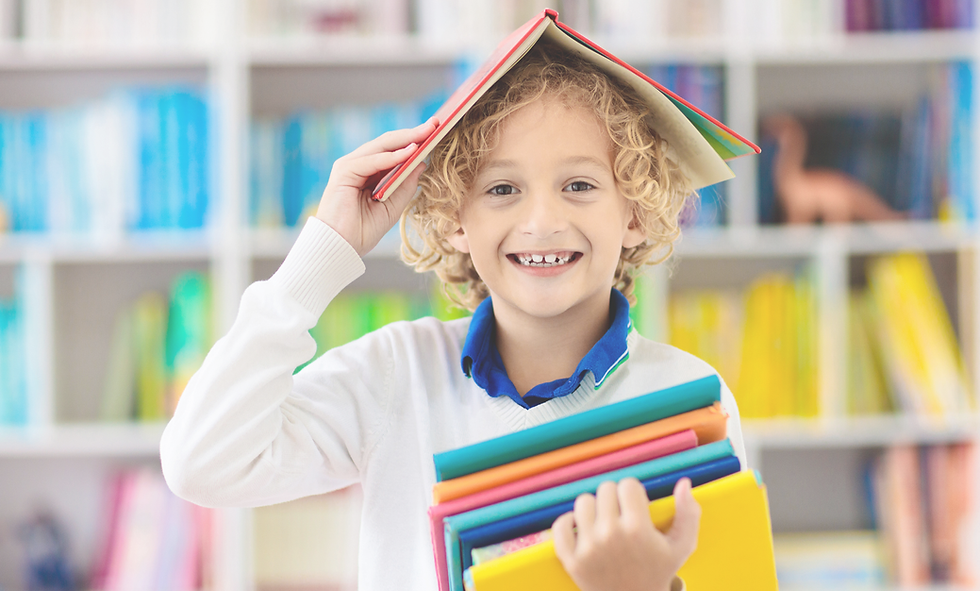Boy with book on head